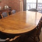 Dining table with 2 Captain Chairs and 8 Horse Head Chairs Romweber Furniture